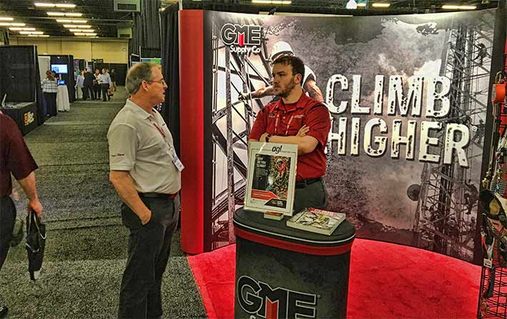 As the show winds down, Caleb Messer of GME Supply Co. talks to an attendee in the exhibit hall.