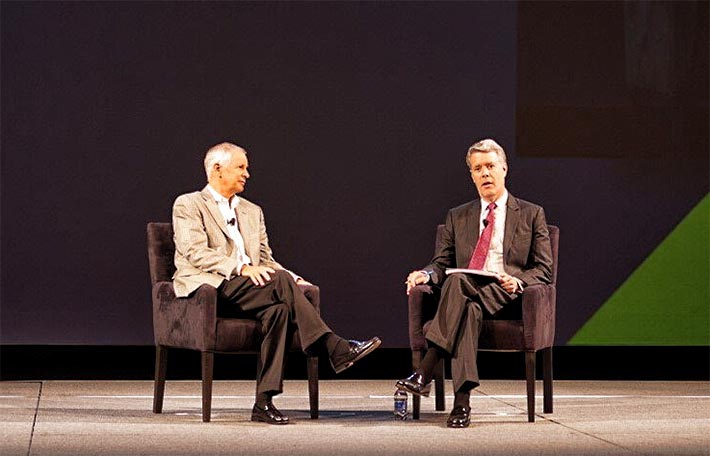 Dish Chairman Charlie Ergen (left) was interviewed by former FCC Commissioner Rob McDowell