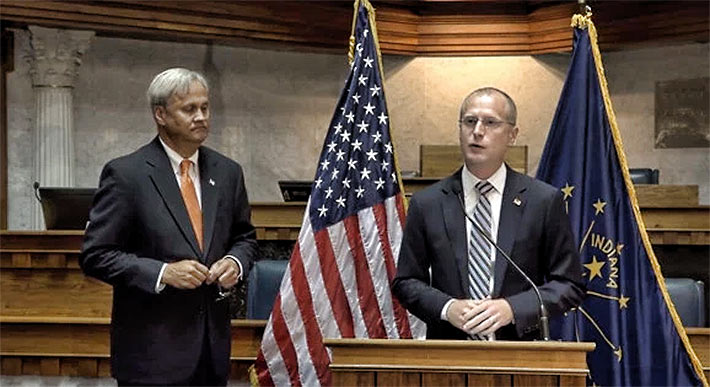 Indiana State Senator Jim Merritt (left) and FCC Commissioner Brendan Carr discuss 5G deployment in Indianapolis, Ind.