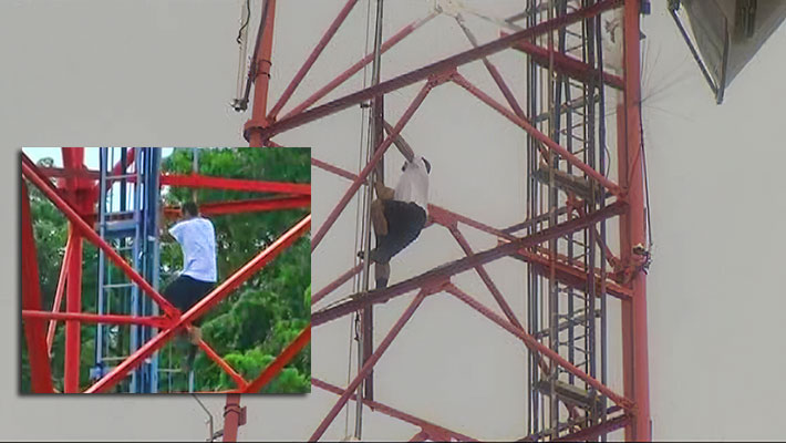 For over seven hours yesterday, Orlando, Fla. emergency workers tried to coax an unauthorized climber down from a TV tower. He eventually came down on his own accord. 
