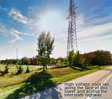 Tower tech is shocked when his measuring comes into contact with power line