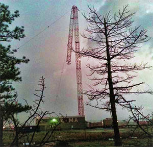 The three Blaw-Knox towers had been built to also support an emergency broadcast station housed three stories below the station's transmitter building