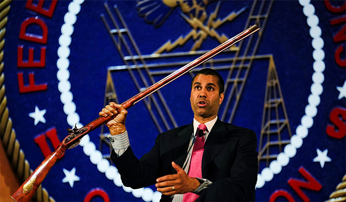 FCC Chairman Ajit Pai was symbolically presented with a Kentucky handmade long gun in recognition of his receiving the National Rifle Association’s Charlton Heston Courage Under Fire award, but he has to pick it up at the NRA’s museum since weapons weren’t allowed at the Conservative Political Action Conference in Maryland. He most likely will not be able to bring it into FCC headquarters unless he can get it plugged and reclassified by Public Safety & Homeland Security as a giant swizzle stick for his over-sized Reese’s coffee mug.