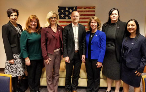 Women of NATE pictured with FCC Commissioner Brendan Carr are, from left, Miranda Allen, Therese O'Brien, Heather Gastelum, Paula Nurnberg, Andy Lee and Shama Ray