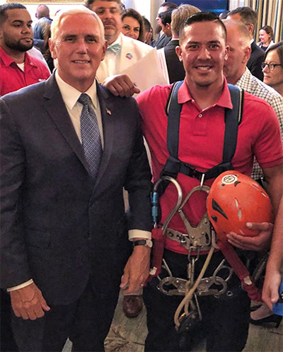 Vice-President Mike Pence and tower tech foreman Ky Nguyen.