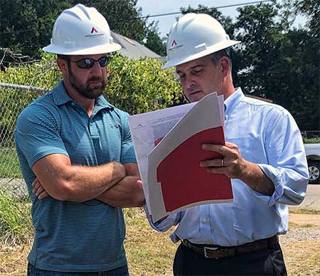 Congressman Mullin visits with Michael Queenan from American Tower Corporation during the tower site tour