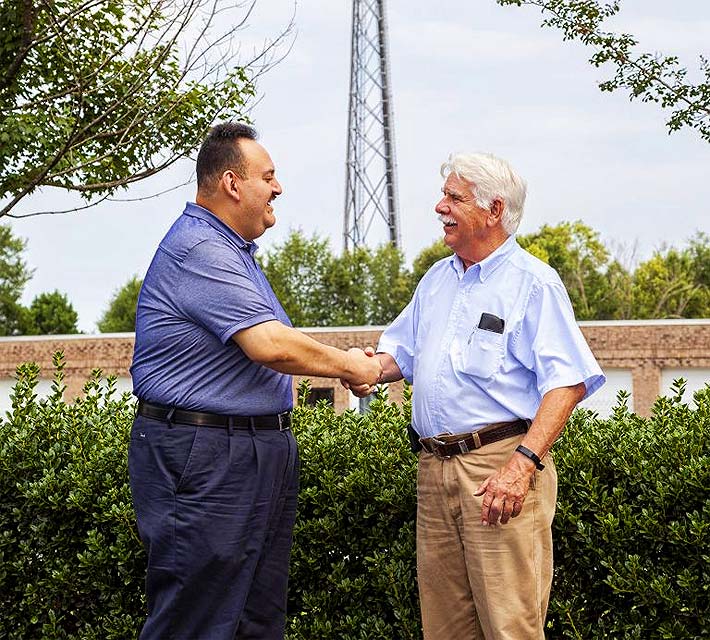 LBA Group CEO Lawrence Behr (r) welcomes new Group Chief Technical Officer Juan Macias to LBA’s Greenville, NC campus