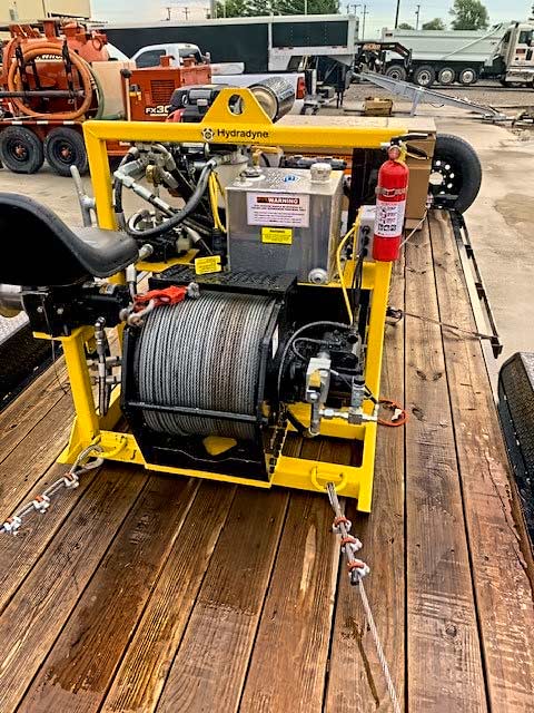 This Hydradyne hoist and a trailer were stolen off a BL Tower Construction job site in Oklahoma. The company is offering a reward for its return.