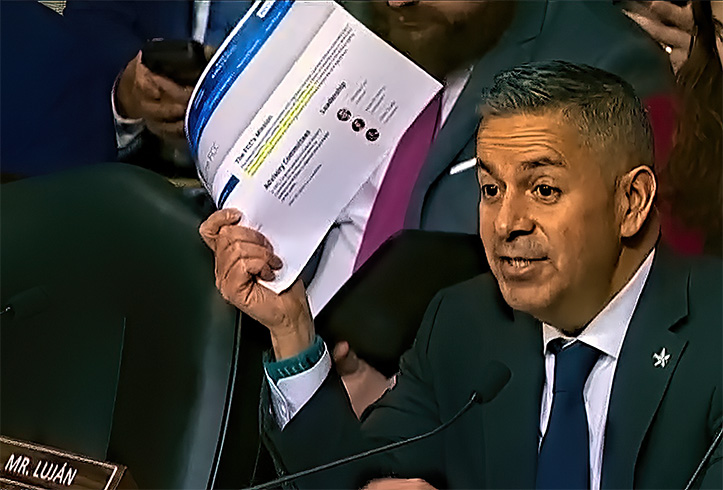 Sen. Ben Ray Luján brandishes a printout of the FCC’s homepage during a heated oversight hearing, using the agency’s own words to box in Chairman Brendan Carr on whether the commission is truly “independent.” The prop did its job. By forcing FCC leadership to either disavow the website or change it, Luján turned a semantic dispute into a public showdown over agency autonomy—one that ended with the word “independent” quietly vanishing from the FCC’s site.